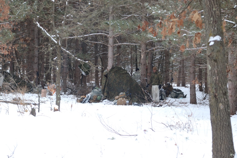 Cold-Weather Operations Course Class 20-02 students conduct field ops, improvised shelter construction