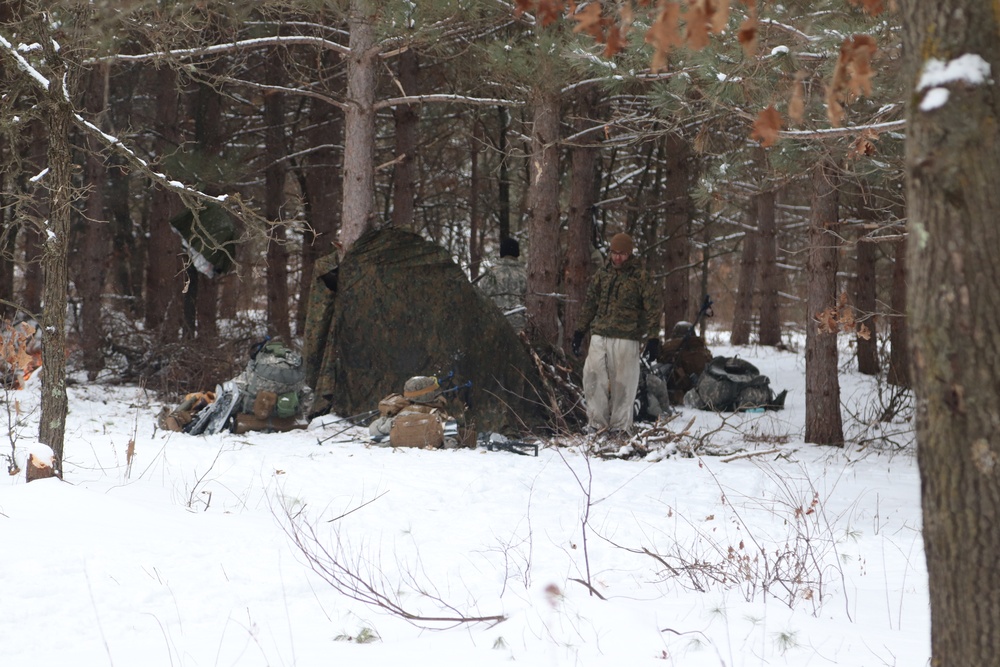 Cold-Weather Operations Course Class 20-02 students conduct field ops, improvised shelter construction