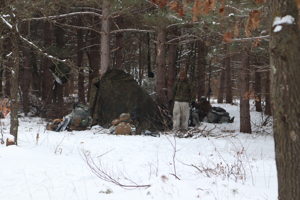 Cold-Weather Operations Course Class 20-02 students conduct field ops, improvised shelter construction