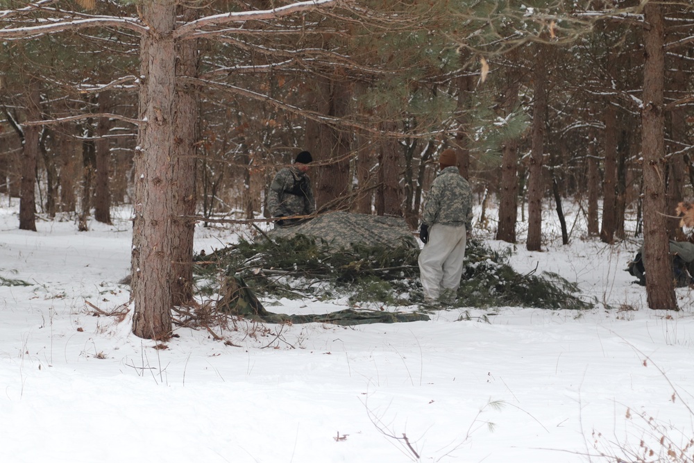 Cold-Weather Operations Course Class 20-02 students conduct field ops, improvised shelter construction