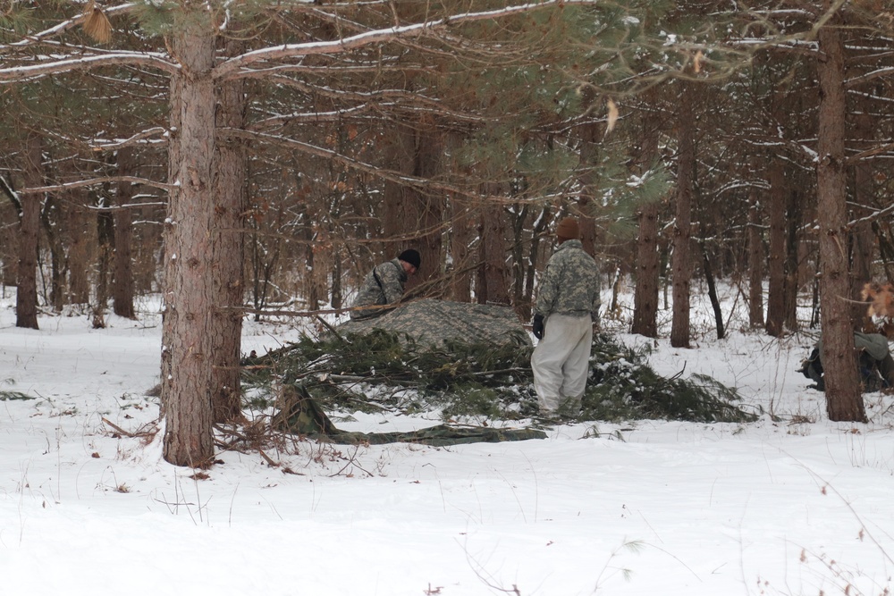 Cold-Weather Operations Course Class 20-02 students conduct field ops, improvised shelter construction