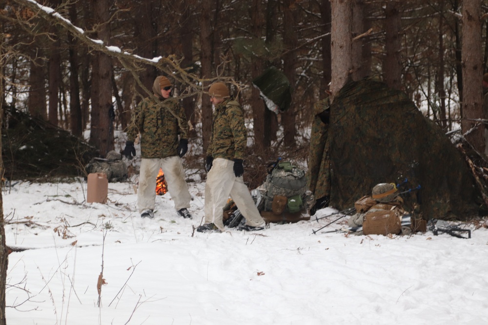 Cold-Weather Operations Course Class 20-02 students conduct field ops, improvised shelter construction