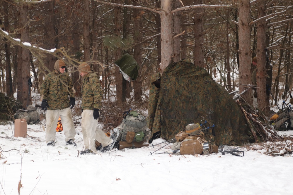 Cold-Weather Operations Course Class 20-02 students conduct field ops, improvised shelter construction