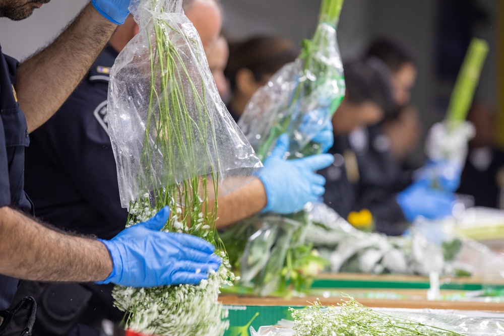 CBP agriculture specialists inspect cut flowers prior to Valentine’s Day