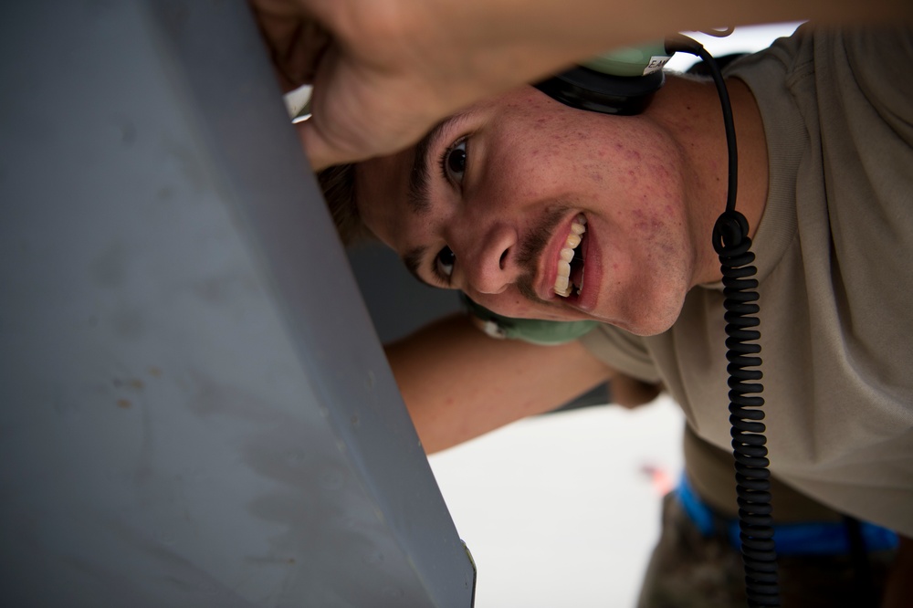 A U.S. Air Force KC-135 aircrew assigned to the 28th Expeditionary Air Refueling Squadron conducts aerial refueling