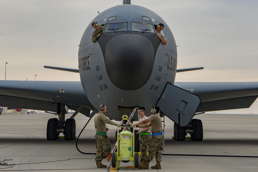 A U.S. Air Force KC-135 aircrew assigned to the 28th Expeditionary Air Refueling Squadron conducts aerial refueling