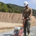 U.S. Navy Seabees with NMCB-5’s Detail Thailand work on a joint project with Marines from 9th Engineer Support Battalion and Royal Thai Marine Corps Engineers