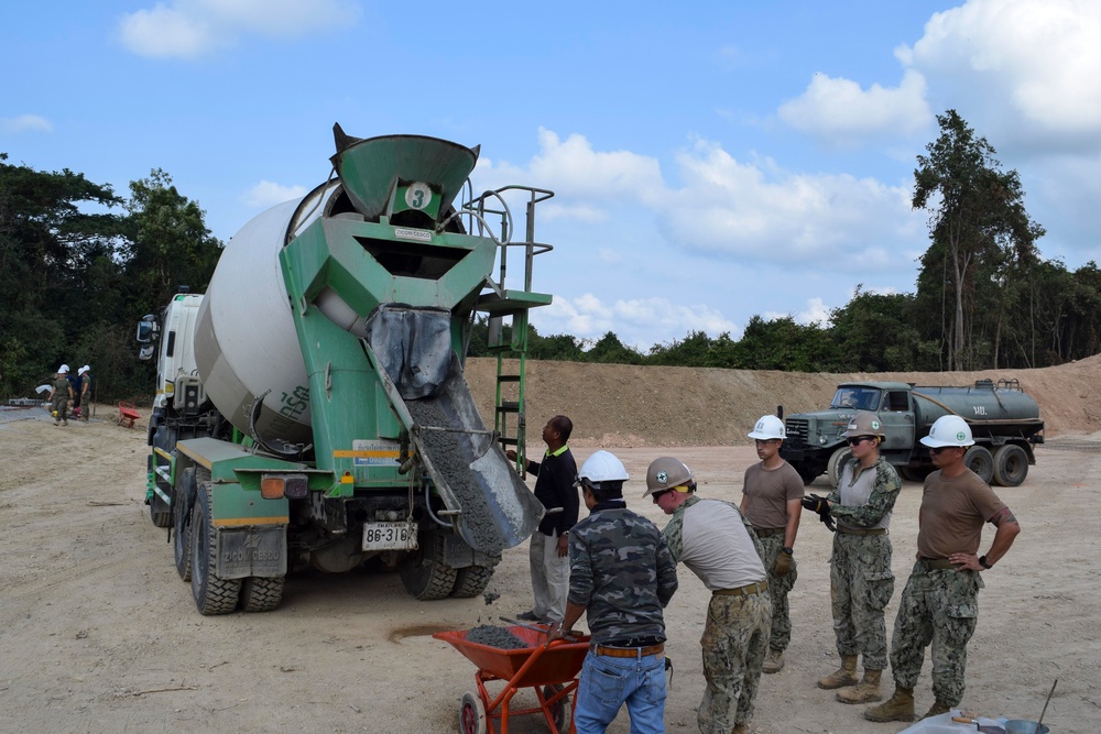 U.S. Navy Seabees with NMCB-5’s Detail Thailand work on a joint project with Marines from 9th Engineer Support Battalion and Royal Thai Marine Corps Engineers