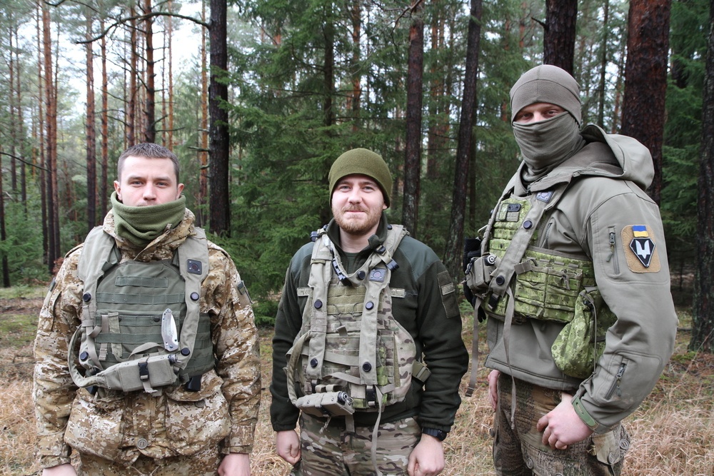 Ukrainian soldiers take a break from operations
