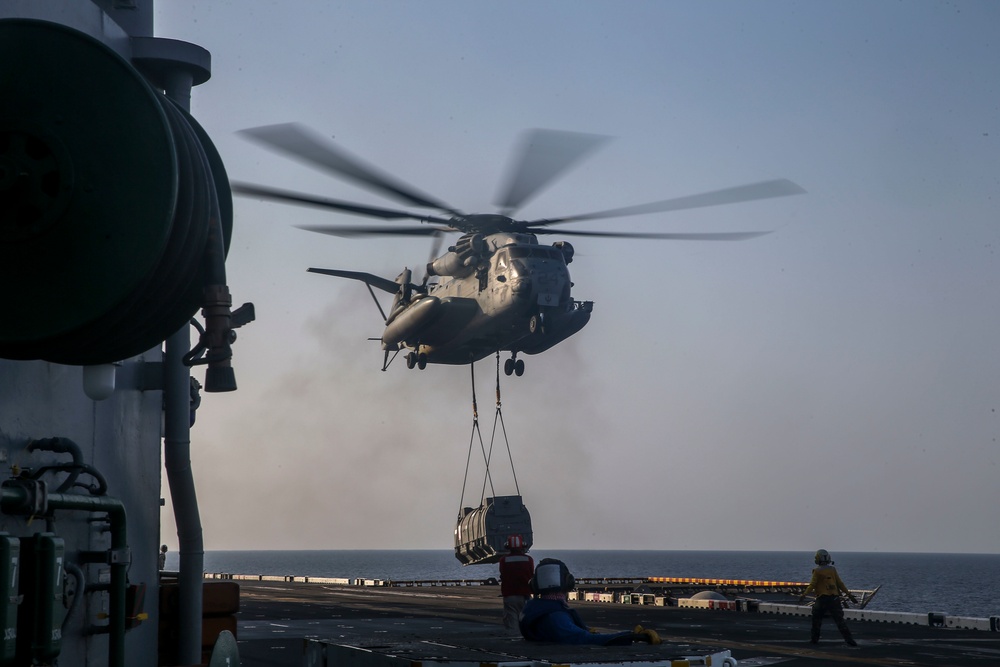 Helicopter Support Team Transports Harrier Engine