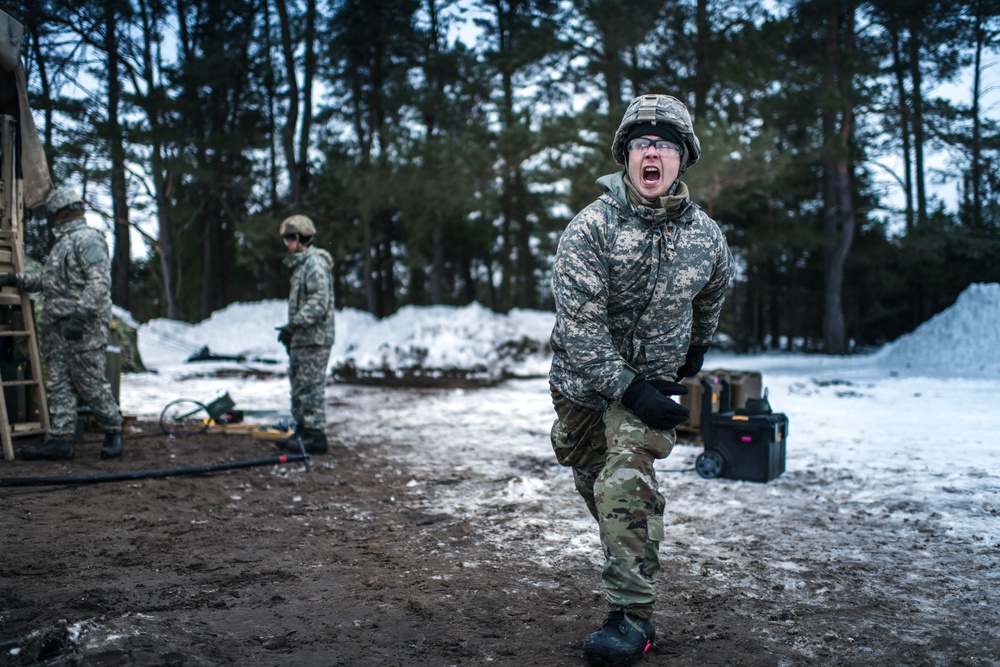 Wisconsin National Guard field artillery conducts winter training during Northern Strike 20-2