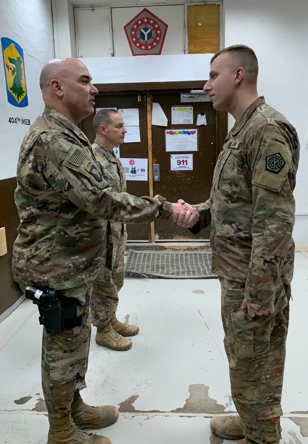 Deployed Illinois Soldiers awarded the Commander’s Coin of Excellence