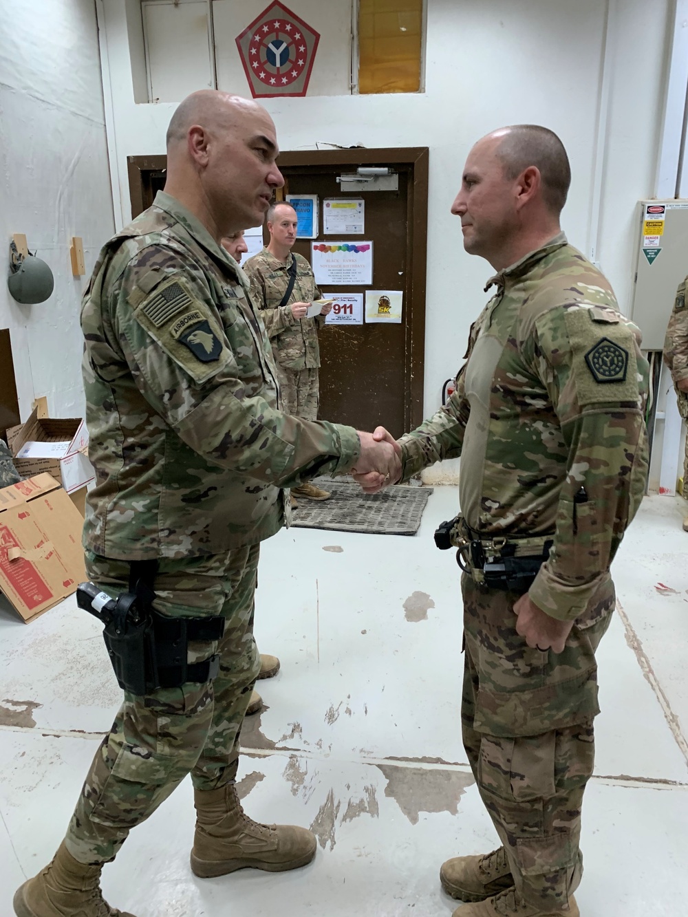 Deployed Illinois Soldiers awarded the Commander’s Coin of Excellence