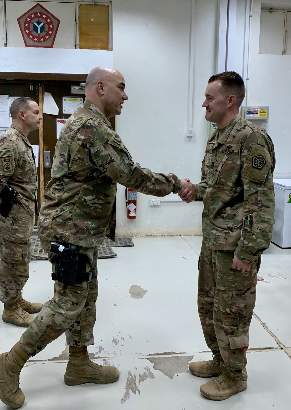 Deployed Illinois Soldiers awarded the Commander’s Coin of Excellence