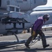 Sailors and Marines take part in flight deck operations