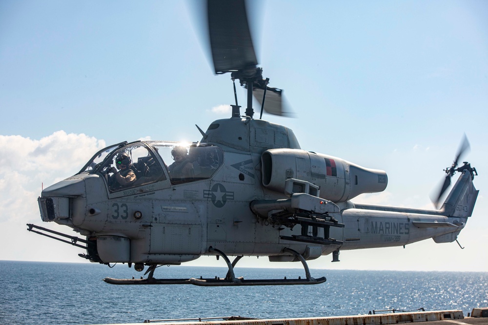 Sailors and Marines take part in flight deck operations