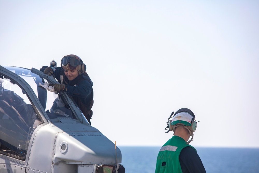 Sailors and Marines take part in flight deck operations