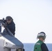 Sailors and Marines take part in flight deck operations