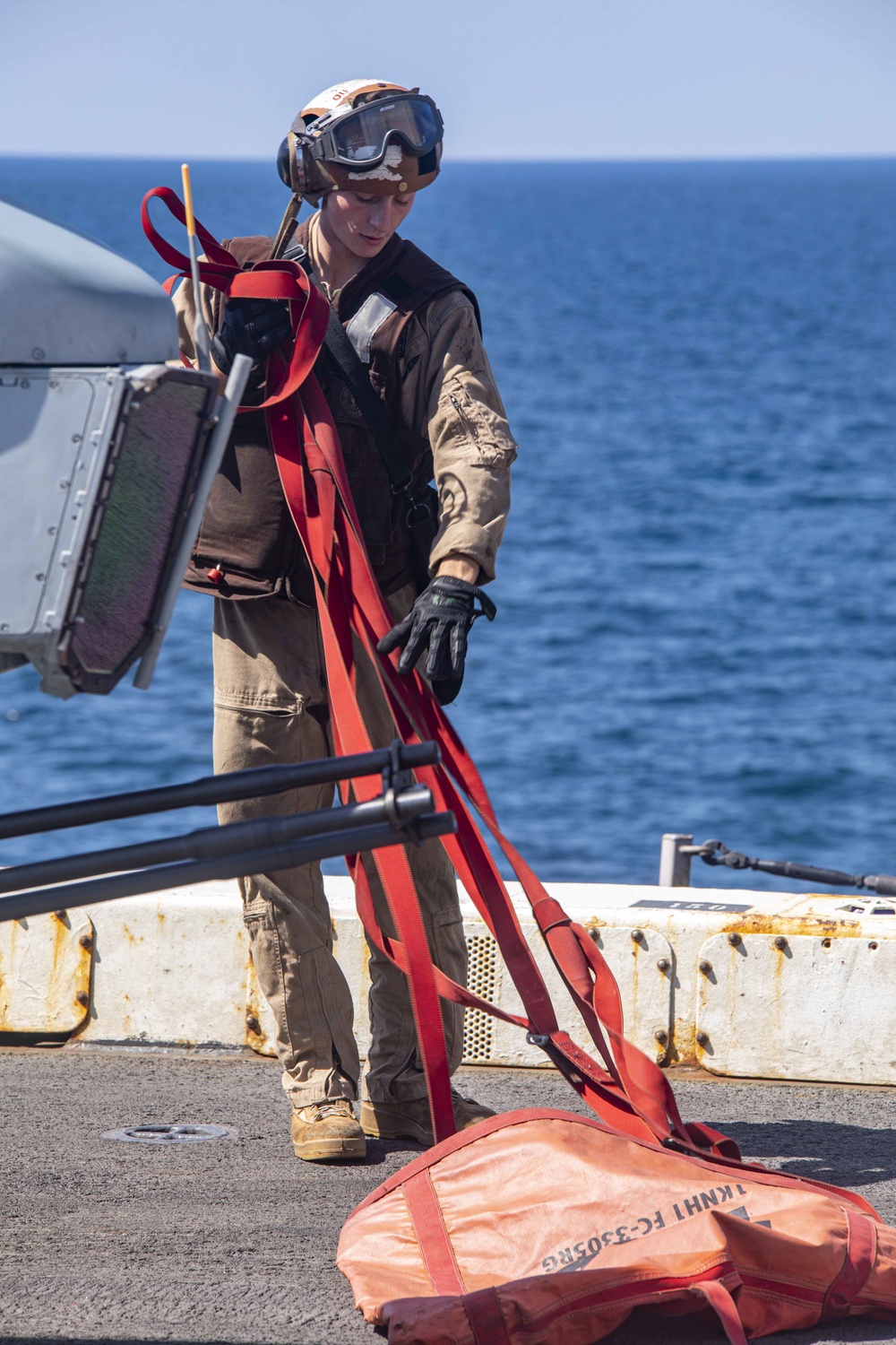 Sailors and Marines take part in flight deck operations