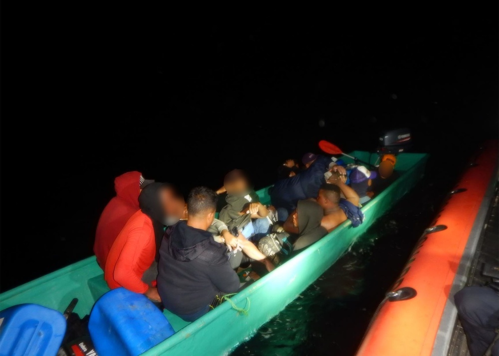 The Coast Guard interdicts 13 illegal migrants 52 miles northwest of Puerto Rico