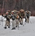 Fort McCoy Cold-Weather Operations Course students practice snowshoeing, ahkio sled use