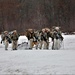 Fort McCoy Cold-Weather Operations Course students practice snowshoeing, ahkio sled use