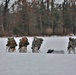 Fort McCoy Cold-Weather Operations Course students practice snowshoeing, ahkio sled use