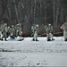 Fort McCoy Cold-Weather Operations Course students practice snowshoeing, ahkio sled use