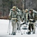 Fort McCoy Cold-Weather Operations Course students practice snowshoeing, ahkio sled use