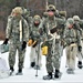 Fort McCoy Cold-Weather Operations Course students practice snowshoeing, ahkio sled use