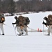 Fort McCoy Cold-Weather Operations Course students practice snowshoeing, ahkio sled use