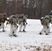 Fort McCoy Cold-Weather Operations Course students practice snowshoeing, ahkio sled use