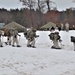 Fort McCoy Cold-Weather Operations Course students practice snowshoeing, ahkio sled use