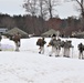 Fort McCoy Cold-Weather Operations Course students practice snowshoeing, ahkio sled use