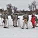 Fort McCoy Cold-Weather Operations Course students practice snowshoeing, ahkio sled use