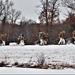 Fort McCoy Cold-Weather Operations Course students practice snowshoeing, ahkio sled use