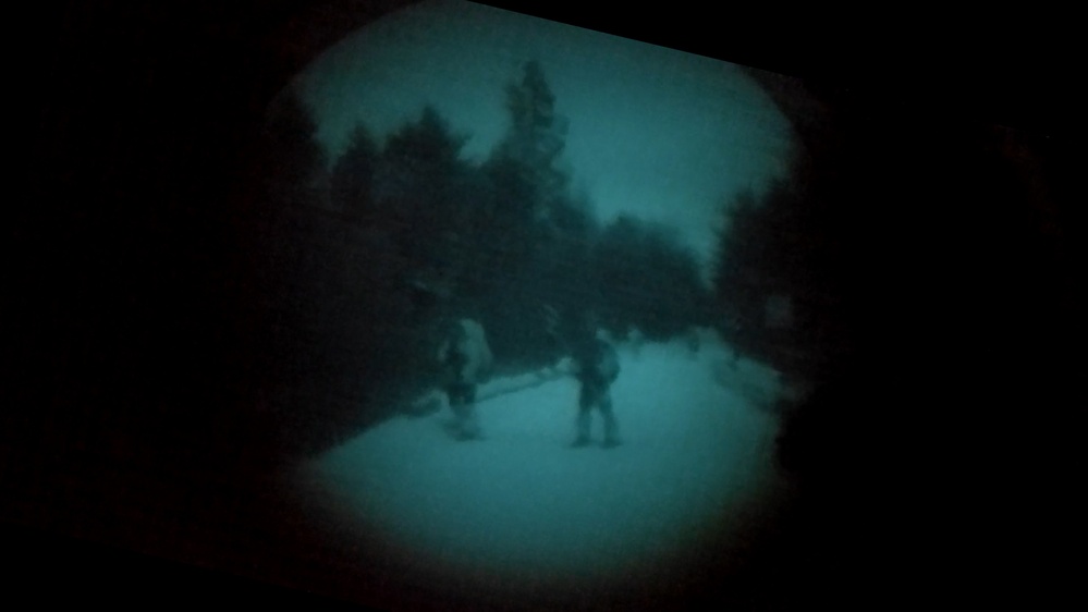 Special Tactics Airmen conduct snow mobile training during EW 20-1