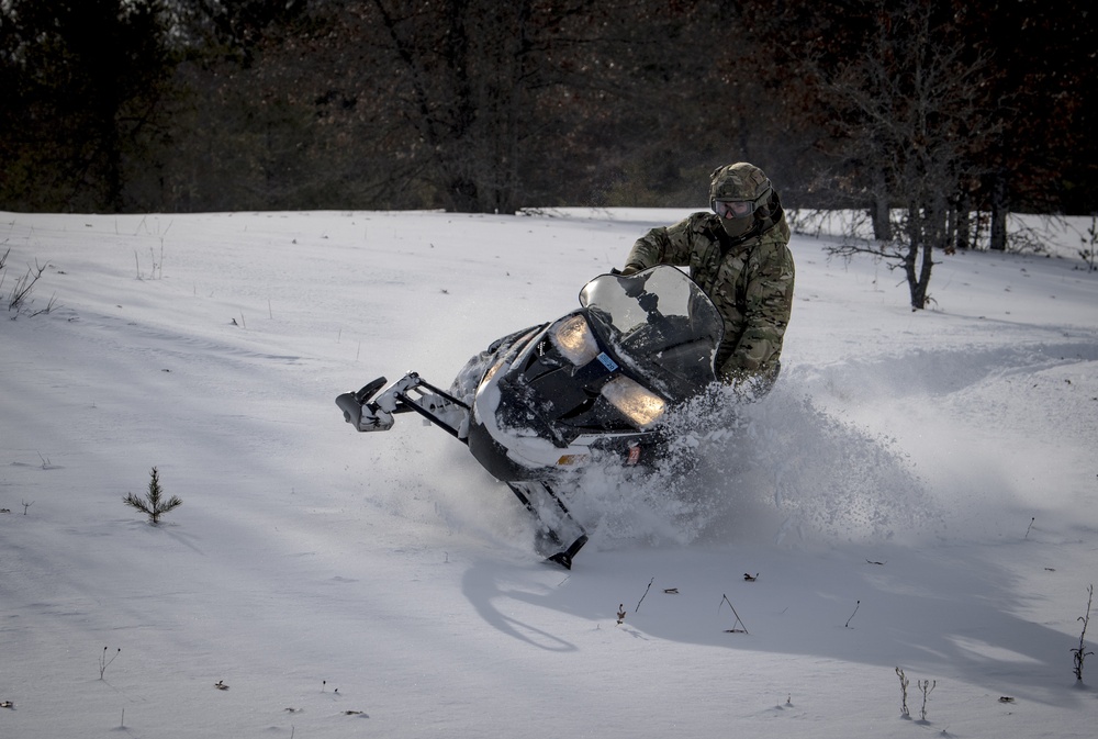 Special Tactics Airmen conduct snow mobile training during EW 20-1