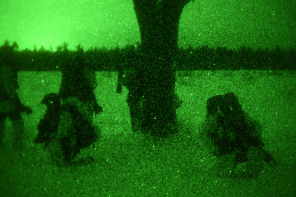 Special Tactics Airmen conduct snow mobile training during EW 20-1