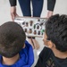 Let's Talk Bugs | Sailors with 3rd Marine Logistics Group volunteer at AmerAsian School