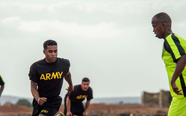 Combined Joint Task Force – Horn of Africa and Djiboutian Army Rapid Intervention Battalion service members participate in friendly soccer match