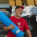 FEMA Blue Tarps Distributed Afetr Quake to Survivors