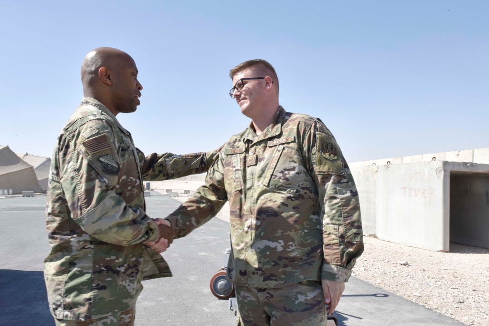 379 AEW command chief visits Airmen on flightline