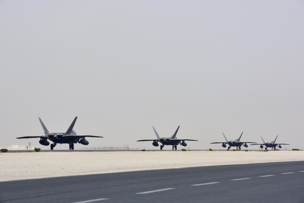 F-22 Raptors launch at Al Udeid Air Base