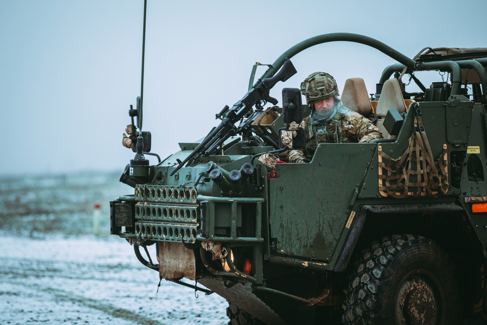 British Soldiers complete section live fire training during eFP