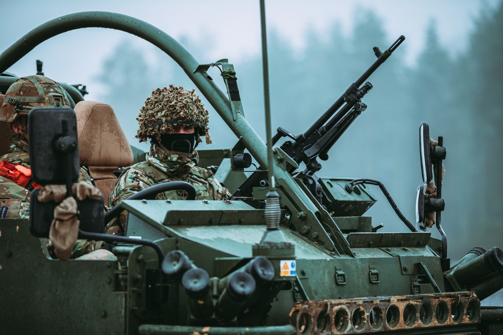 British Soldiers complete section live fire training during eFP