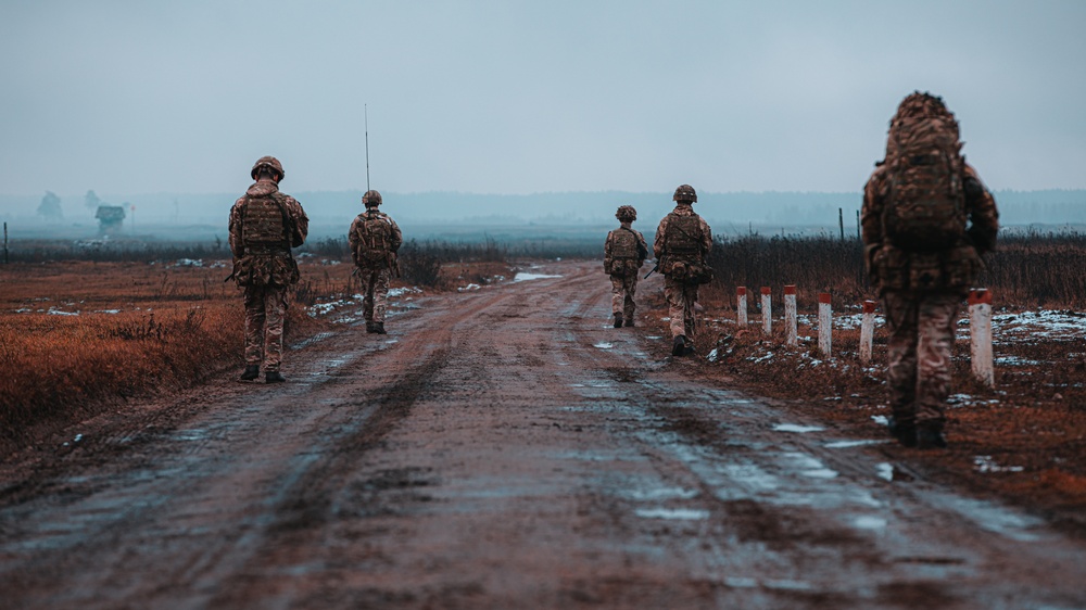 British Soldiers complete section live fire training during eFP