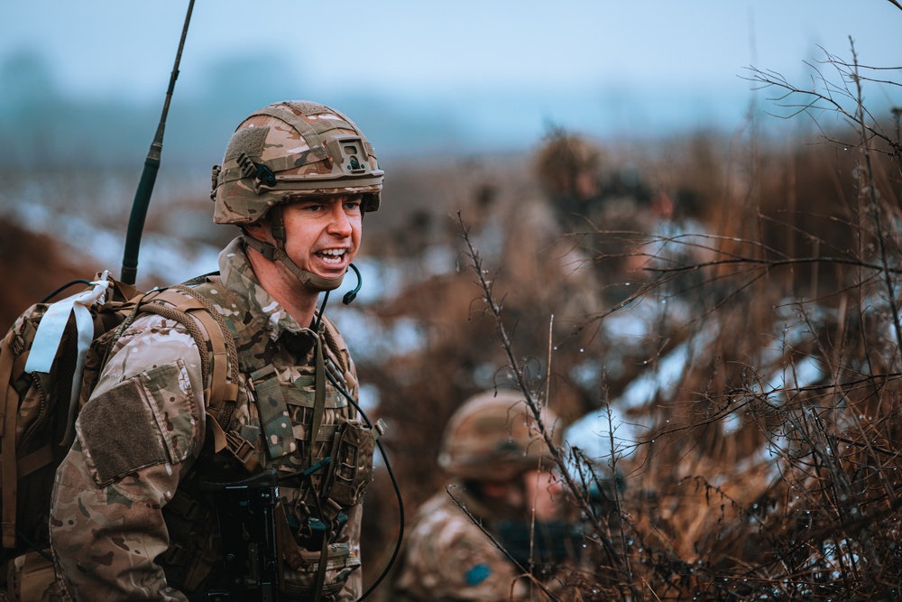 British Soldiers complete section live fire training during eFP