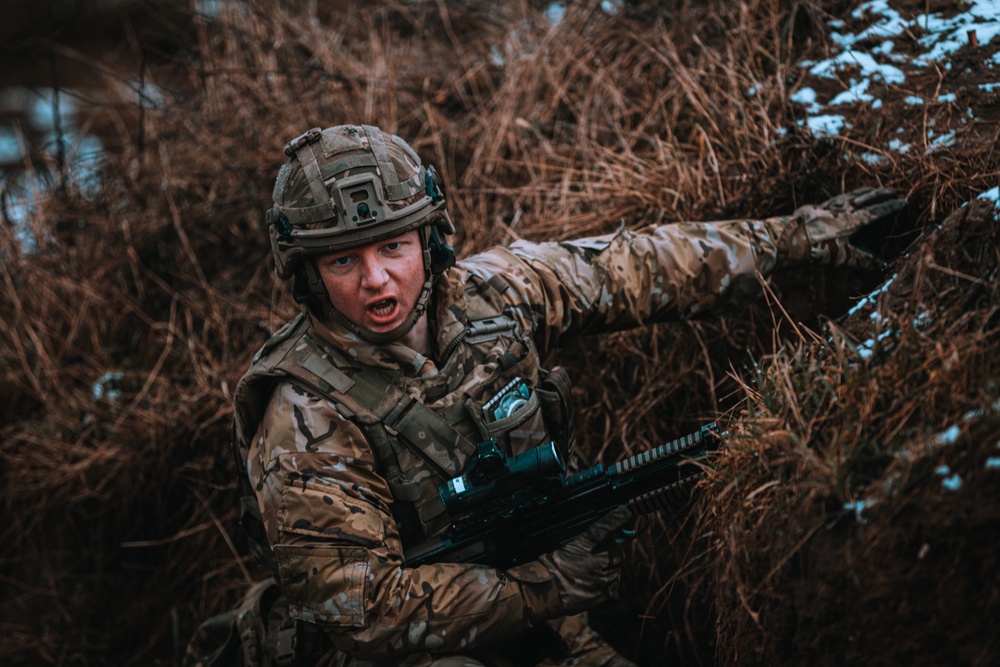 British Soldiers complete section live fire training during eFP