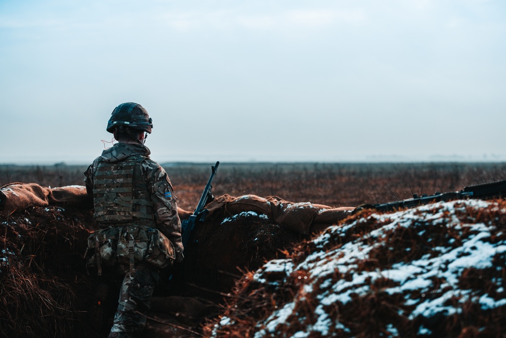 British Soldiers complete section live fire training during eFP